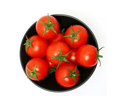 tomatoes in a black bowl from above