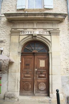 Hotel Dieu in Vaison la Romaine. H�tel-Dieu ("hostel of God") is the old name given to the principal hospital in French towns