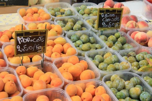 A group of abricots, peaches and plums on a local market in Bedoin, France