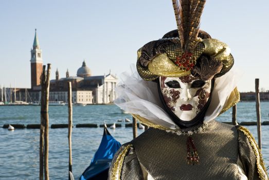 Traditionally dressed Venice carnival  female performer in Piazza San Marco, Italy