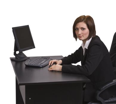 Portrait of a young businesswoman at her desk.