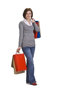 Young casual woman with shopping bags.