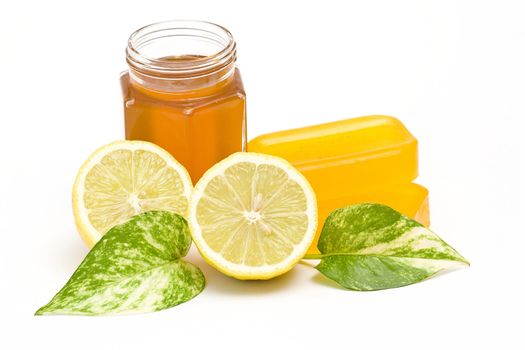 glycerin soap, jar of honey and lemon 