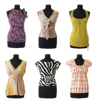 6 female blouses on mannequin torso. Isolated on white background
