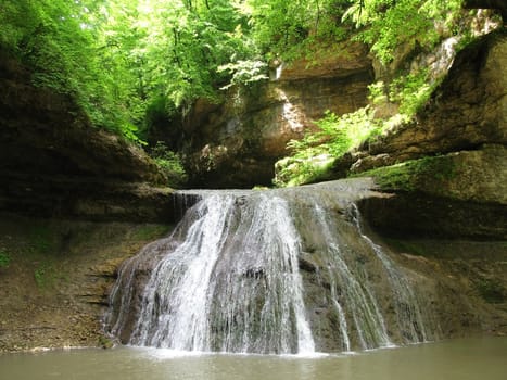 Falls; the river; a stream; water; a moisture; beauty; Caucasus; Russia; the Europe; a relief; a landscape; the nature; a landscape