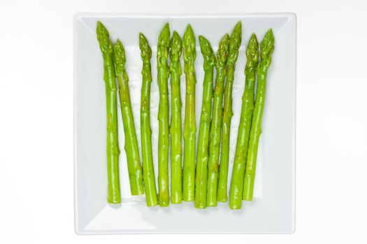 fresh green asparagus isolated on white background