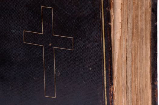 Old bible, over 100 years old, taken on clean white background.