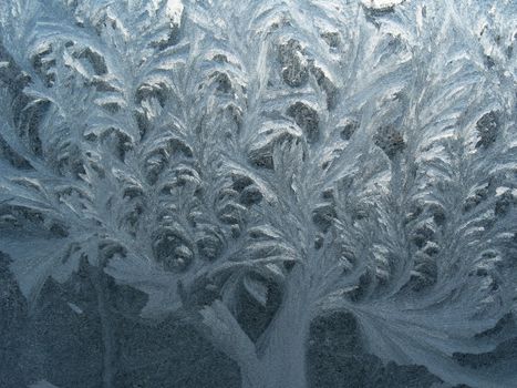 Ice texture on the frozen window glass