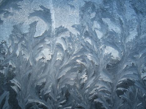 Ice texture on the frozen window glass