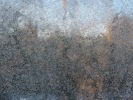 Ice texture on the frozen window glass