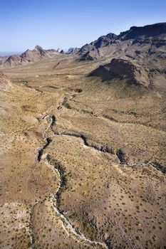 Aerial view of southwestern landscape with mountains.