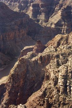 Aerial of southwest desert canyon cliffs and Colorado River gorge in Canyonlands National Park in Utah, USA.