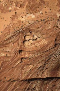 Aerial of textured red rock in desert of Arizona, USA.