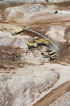 Aerial of heavy equipment vehicles in suburban land development area of Las Vegas, Nevada, USA.