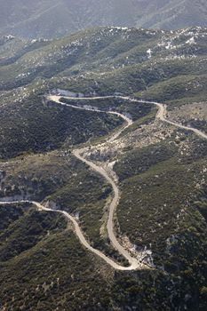 Aerial of winding scenic road in California, USA.