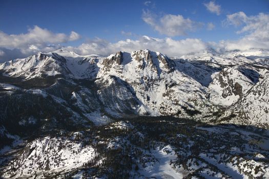 Aerial of snow covered mountain landscape in California, USA.