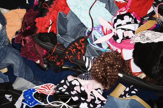 Messy pile of woman's clothing.