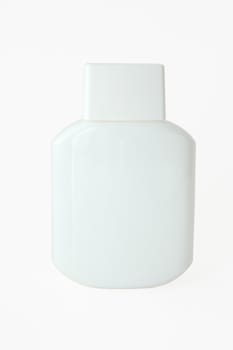 Clear white bottle with aftershave balsam.