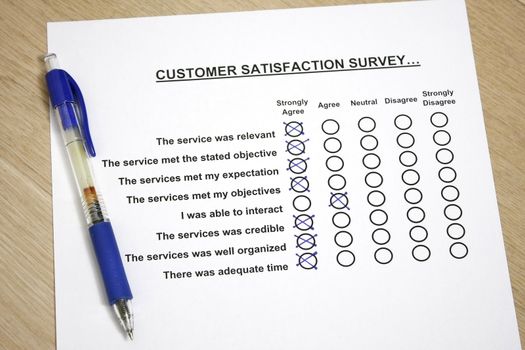 Customer satisfaction survey concept - with tickbox on strongly agree.