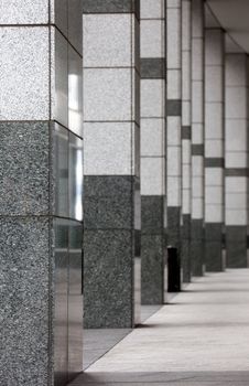 An architectural detail - a stone walk way in an office building