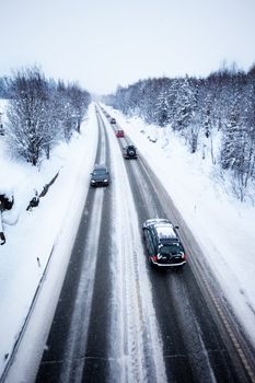 A road in winter during a snow storm