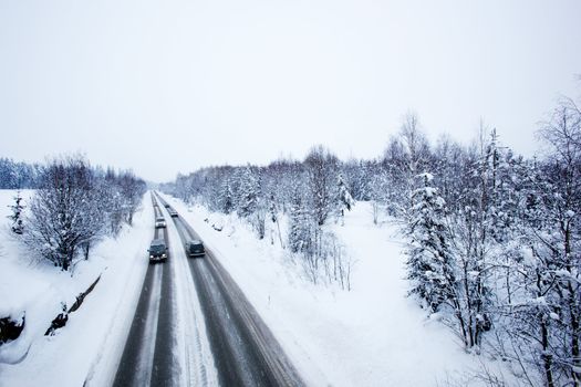 A road in winter during a snow storm