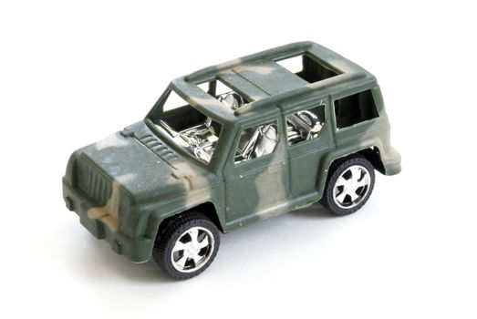 A single toy military vehicle on white background.