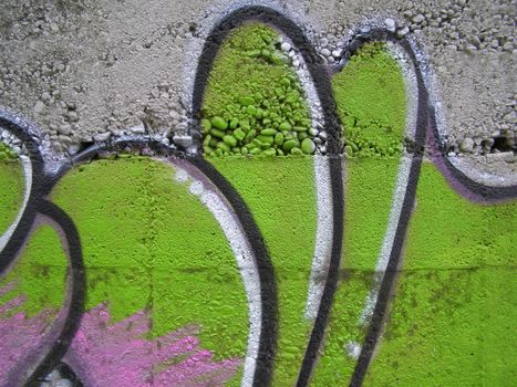 Colour graffiti on raw concrete background