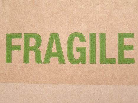 Fragile written on corrugated cardboard box