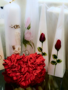 red decorative heart near candles 
