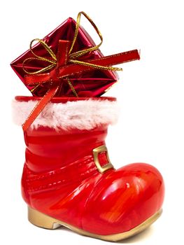 Photo of the red christmas boot against the white background