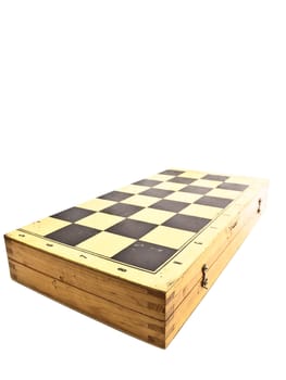 Old wooden closed chessboard against the white background