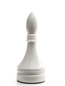 single white bishop in chess against the white background