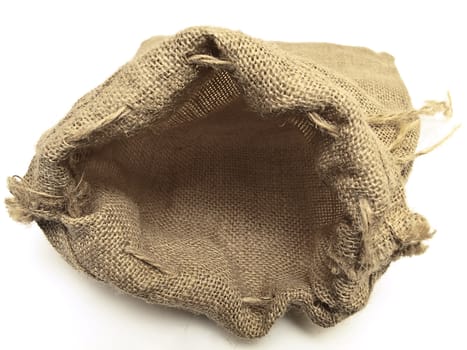 open beige linen sack with the braids against the white background