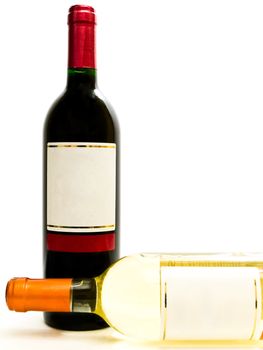 bottles of the white and red wine against the white background
