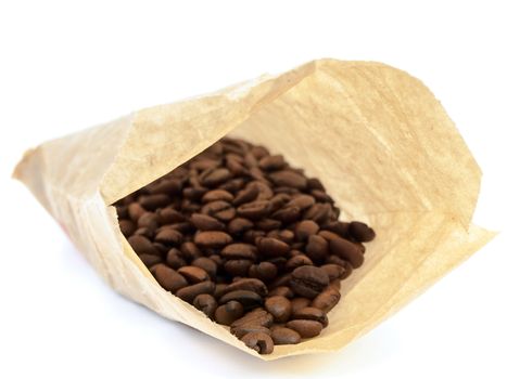 paper sack with coffee beans over the white background