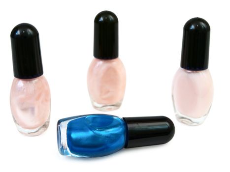bottles with nail polish over the white background 