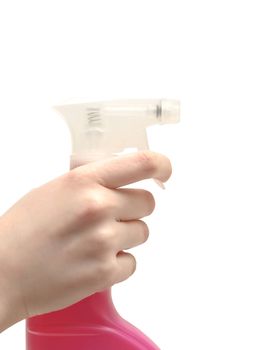 spray in woman hand against white background