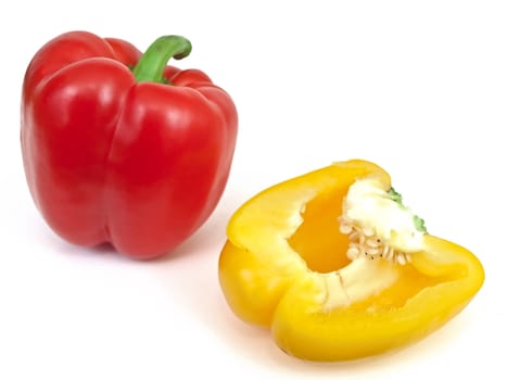 Photo of the red and yellow paprika against the white background