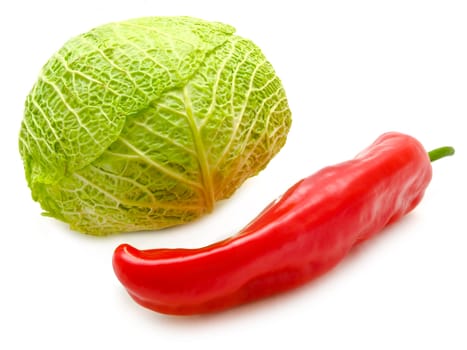 green cabbage and red pepper over the white background