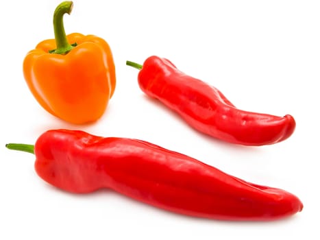 two red peppers and one orange paprika
