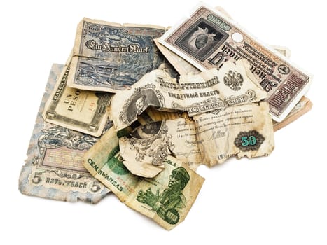 different old paper currency over the white background 
