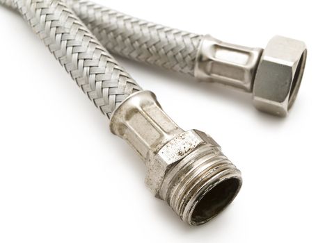 Photo of the metal hose against the white background