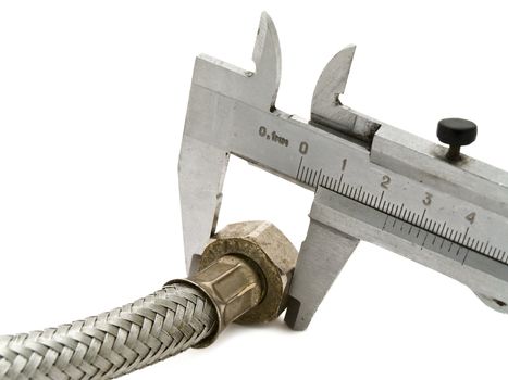 Photo of the metal hose against the white background