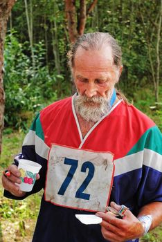 The sportsman after finish considers result listing of  the running