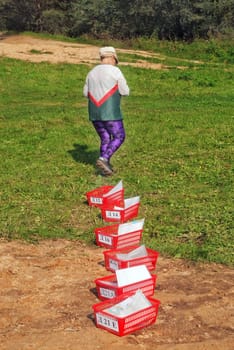 The elderly sportswoman on running orienteering start