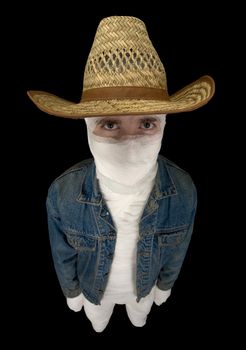 Portrait of totally bandaged cowboy with a hat on