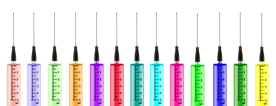 Colorful syringes isolated in white