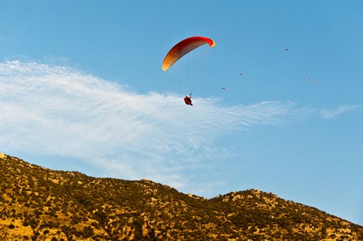 Numerous paragliders above Oludeniz, near Fethiye, Turkey, in great evening light