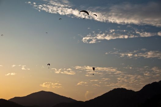 Numerous paragliders above Oludeniz, near Fethiye, Turkey, in great sunset light